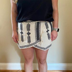 Geometric fringe beige with black detail skort